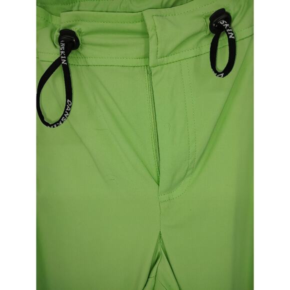 Danskin Woman Green Cropped Pants Size Small Cargo Zip Pockets Adjustable Waist - Picture 3 of 8